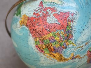 Map of North America illustrating the geographic context of the USMCA, the annual reviews, and trade uncertainty for companies in light of the China factor.